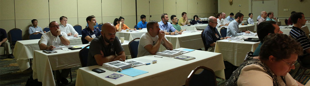 workshop participants listen to a speaker