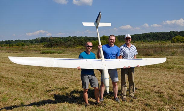 Jack Langelaan and his graduate students Nate Depenbusch and John Bird with AutoSOAR after a successful flight.