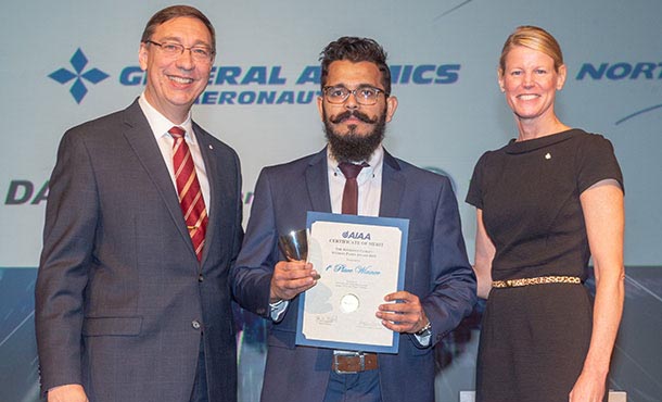 Keerti Prakash (center), doctoral candidate in aerospace engineering, receives the Jefferson Goblet Student Paper Award for the Aerospace Design and Structures Group at the American Institute of Aeronautics and Astronautics Science and Technology Forum and Exposition 2019 in San Diego.